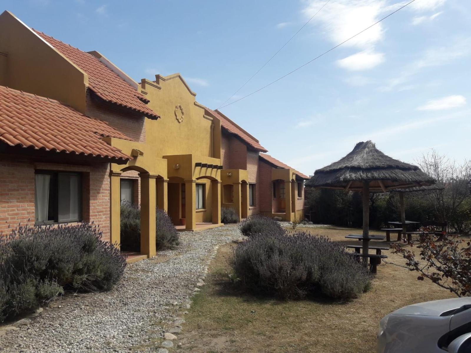 Barranca Del Indio Aparthotel Villa de Merlo Bagian luar foto