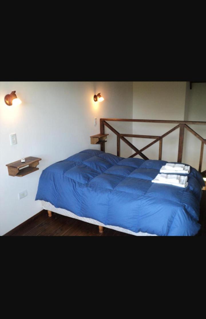 Barranca Del Indio Aparthotel Villa de Merlo Bagian luar foto