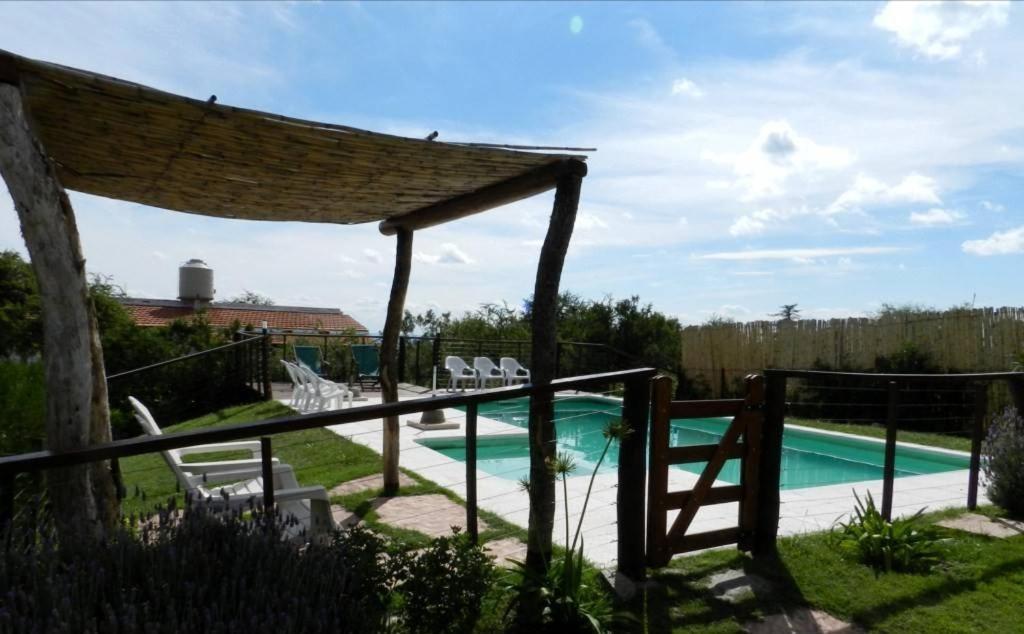 Barranca Del Indio Aparthotel Villa de Merlo Bagian luar foto