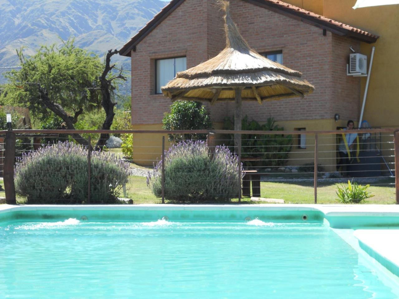 Barranca Del Indio Aparthotel Villa de Merlo Bagian luar foto