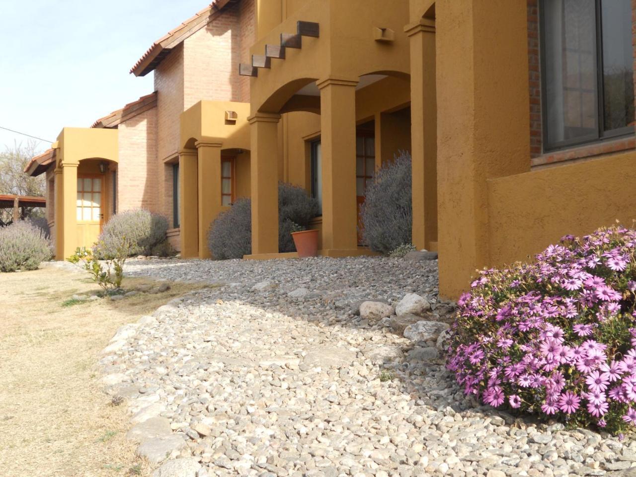 Barranca Del Indio Aparthotel Villa de Merlo Bagian luar foto