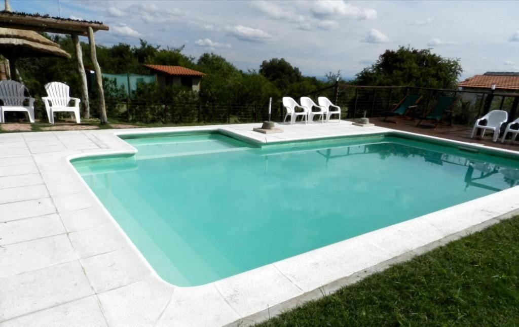 Barranca Del Indio Aparthotel Villa de Merlo Bagian luar foto