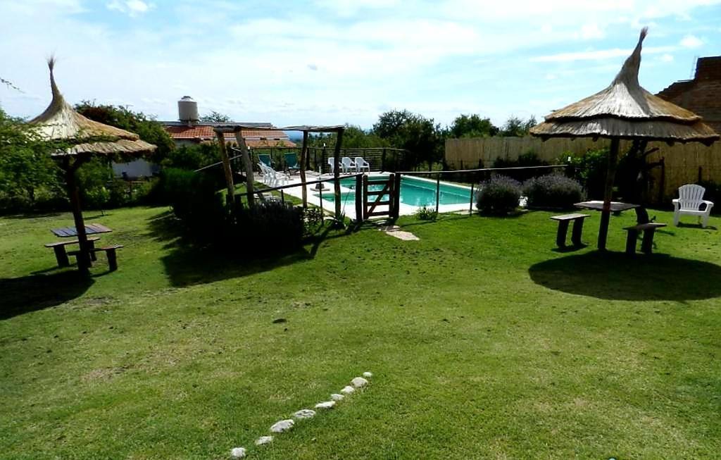 Barranca Del Indio Aparthotel Villa de Merlo Bagian luar foto