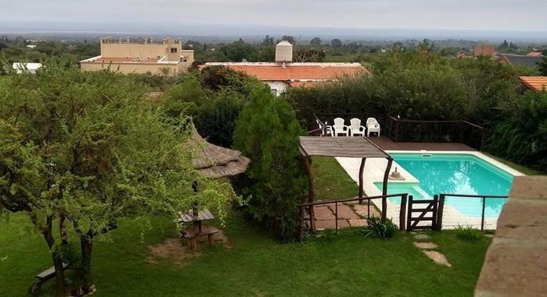 Barranca Del Indio Aparthotel Villa de Merlo Bagian luar foto