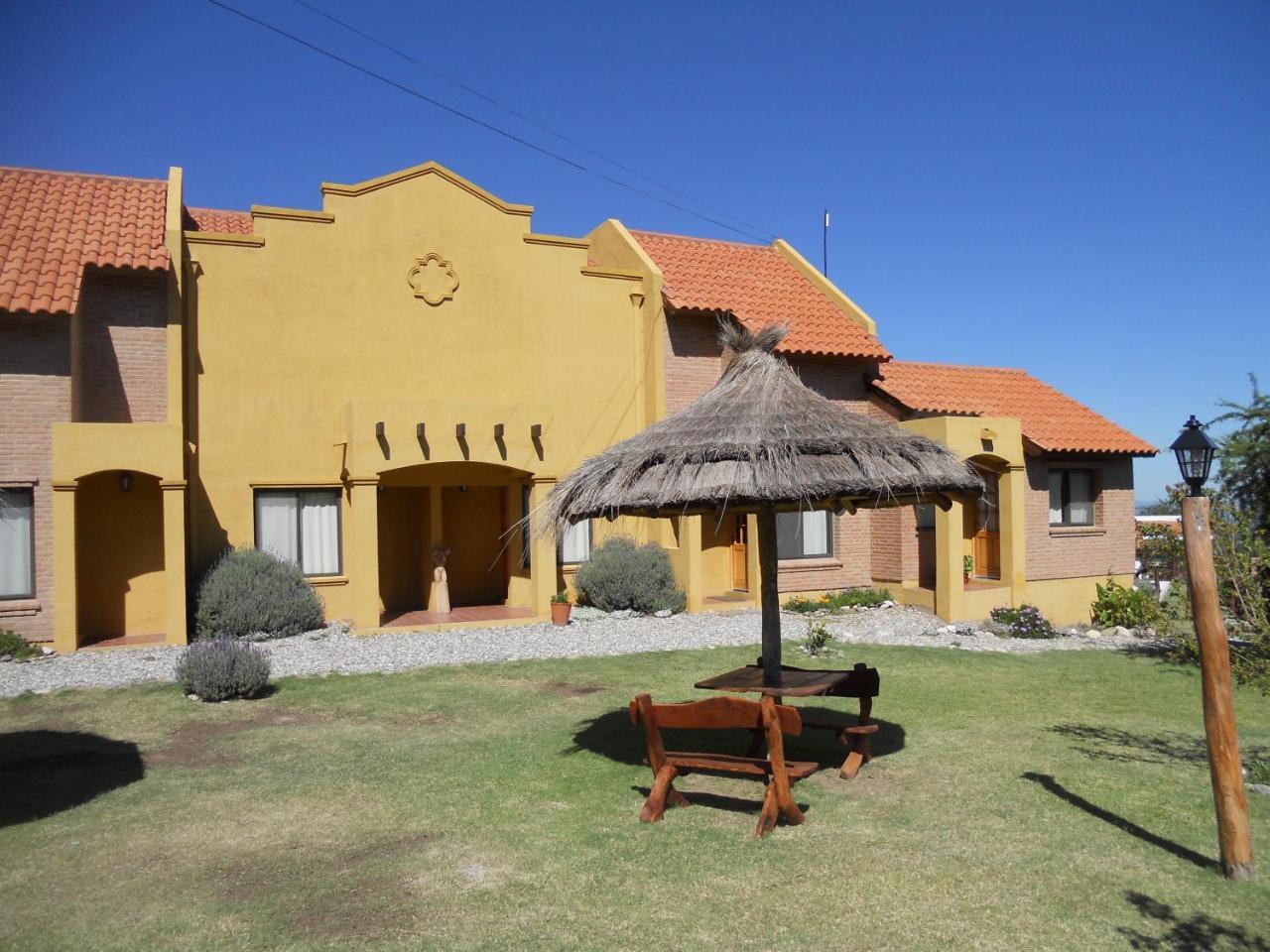 Barranca Del Indio Aparthotel Villa de Merlo Bagian luar foto