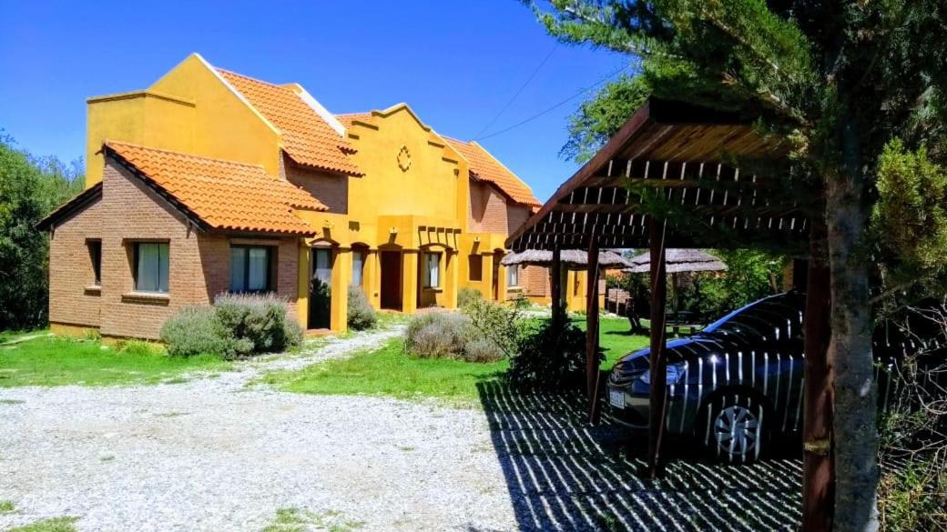 Barranca Del Indio Aparthotel Villa de Merlo Bagian luar foto