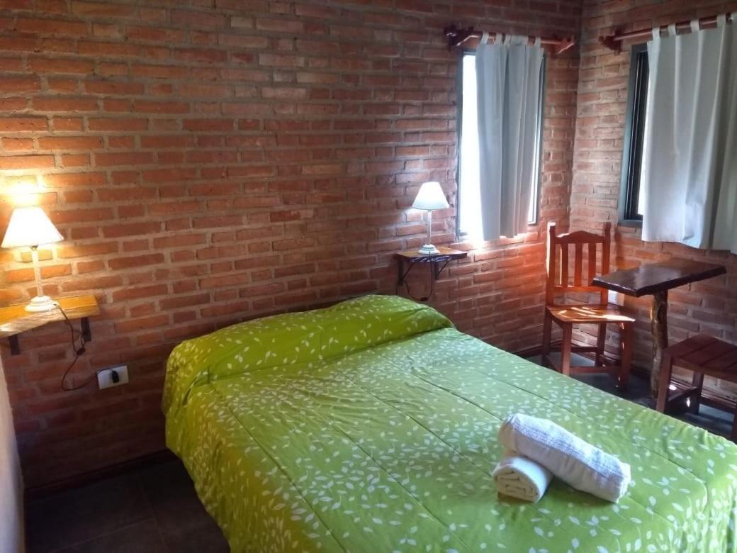 Barranca Del Indio Aparthotel Villa de Merlo Bagian luar foto