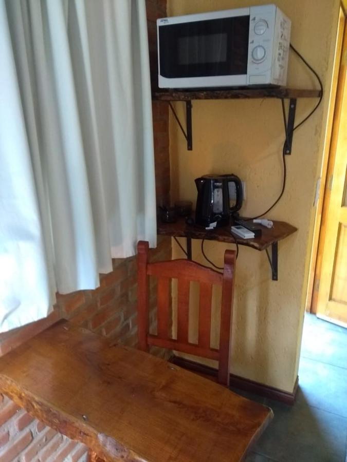 Barranca Del Indio Aparthotel Villa de Merlo Bagian luar foto