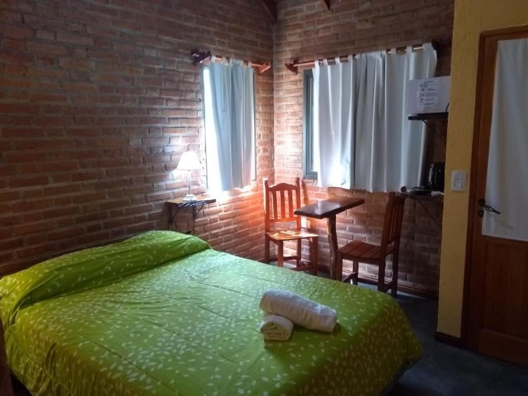 Barranca Del Indio Aparthotel Villa de Merlo Bagian luar foto